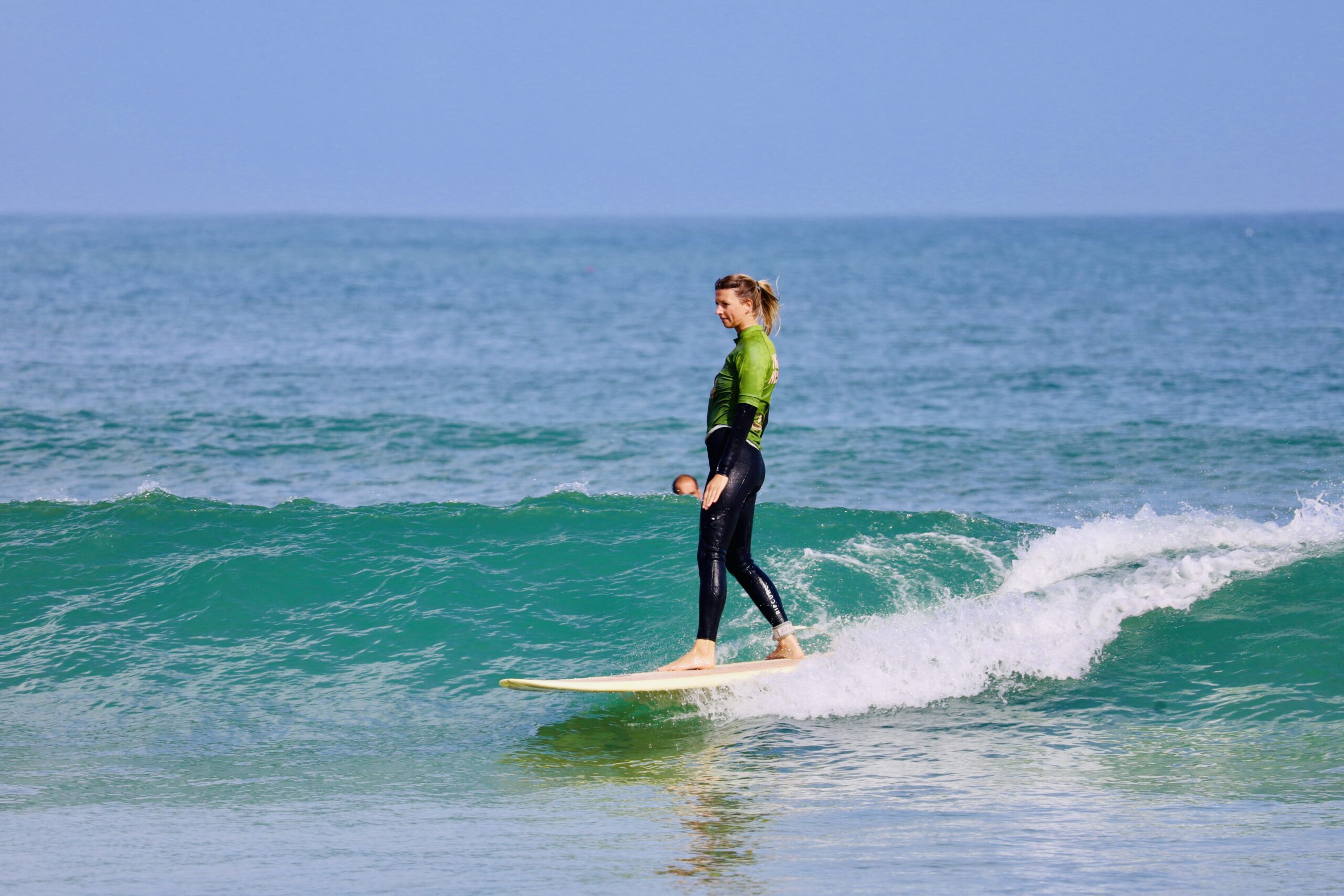 Balance and glide on a green wave.